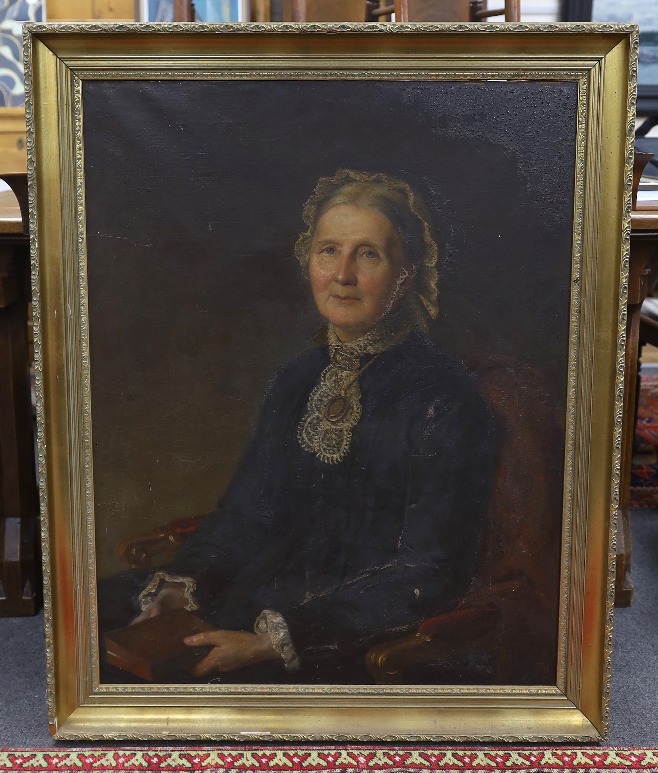 19th century English school, oil on canvas, Portrait of a seated lady wearing mourning dress, monogrammed TAJ, 90cm x 69cm